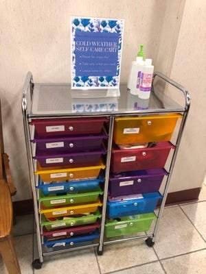 The cold weather self-care cart at the Western Pocono Community Library contains hygiene products as well as gloves, hats and socks, as seen on Thursday, February 22, 2024.