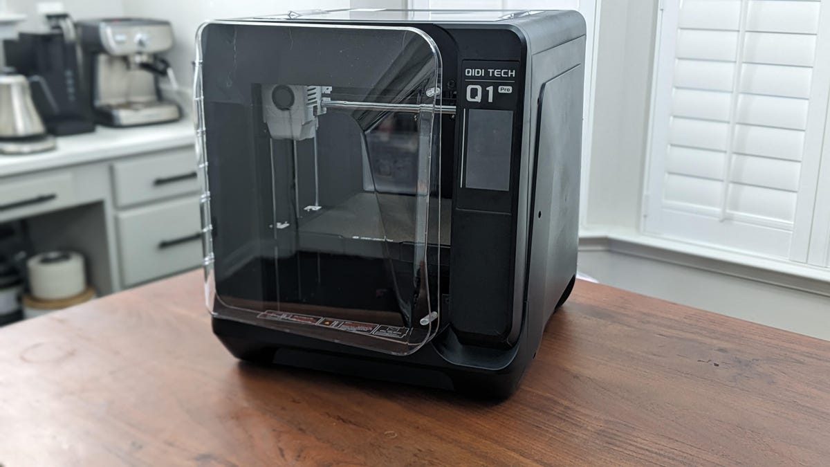 A Qidi Tech Q1 Pro on a kitchen table